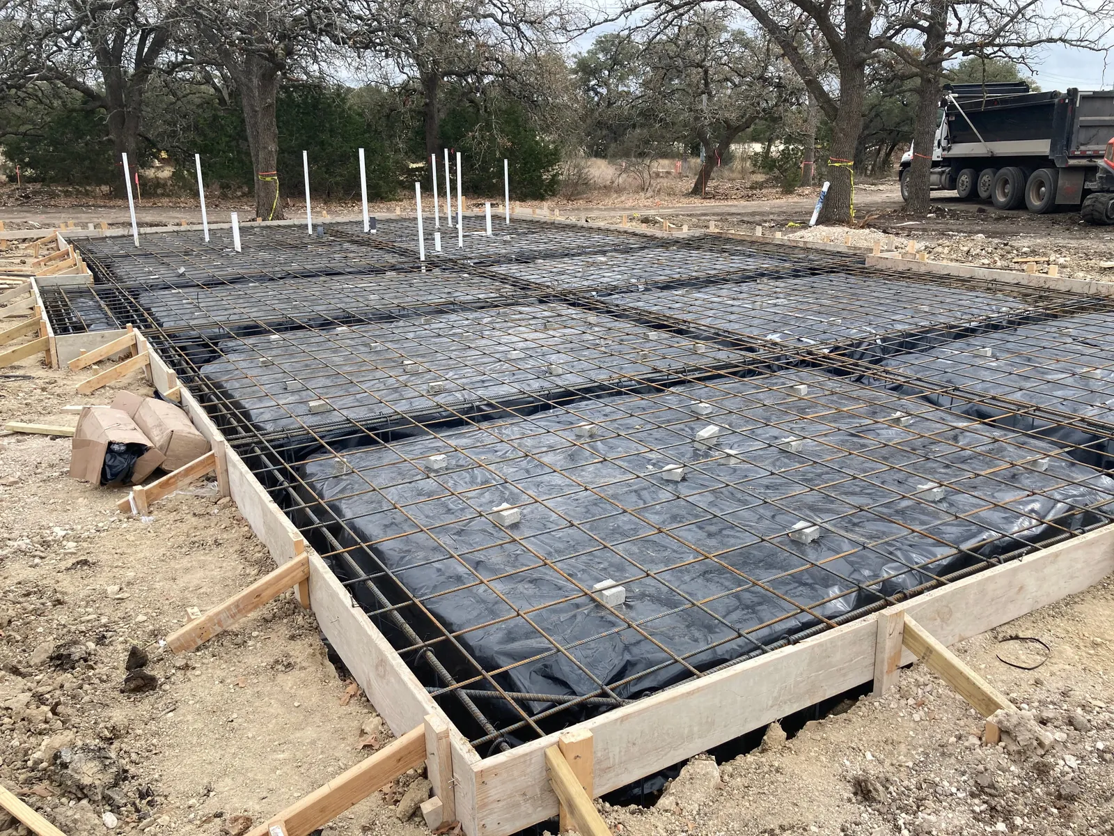 Foundation formwork and rebar prepared for pour